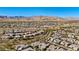 Aerial view showcasing a large community with upscale homes and mountain views at 39 Cranberry Cove Ct, Las Vegas, NV 89135