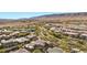 Aerial view of a residential neighborhood with modern homes and mountain backdrop at 39 Cranberry Cove Ct, Las Vegas, NV 89135