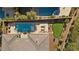 Aerial view of backyard, showcasing a pool and putting green at 39 Cranberry Cove Ct, Las Vegas, NV 89135