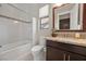 Clean bathroom with a shower/tub combo and granite vanity at 39 Cranberry Cove Ct, Las Vegas, NV 89135