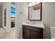 Modern bathroom with dark vanity and white countertop at 39 Cranberry Cove Ct, Las Vegas, NV 89135