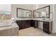 Bathroom with double vanity and corner makeup vanity at 39 Cranberry Cove Ct, Las Vegas, NV 89135