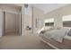 Serene bedroom with calming decor and access to another room at 39 Cranberry Cove Ct, Las Vegas, NV 89135