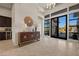 Bright and spacious entryway with contemporary console table and large windows at 39 Cranberry Cove Ct, Las Vegas, NV 89135