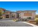 Modern home with two-car garage and stone exterior at 39 Cranberry Cove Ct, Las Vegas, NV 89135