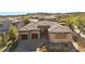 Modern home with stone and stucco exterior; aerial view at 39 Cranberry Cove Ct, Las Vegas, NV 89135