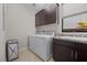 Bright laundry room with washer, dryer, and cabinets at 39 Cranberry Cove Ct, Las Vegas, NV 89135