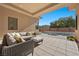 Relaxing patio with outdoor seating and view of pool at 39 Cranberry Cove Ct, Las Vegas, NV 89135