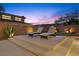 Landscaped patio with built-in seating, offering a relaxing outdoor space at 39 Cranberry Cove Ct, Las Vegas, NV 89135