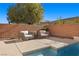 Relaxing poolside patio with comfortable seating at 39 Cranberry Cove Ct, Las Vegas, NV 89135