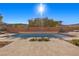 Stunning pool and patio with desert landscaping at 39 Cranberry Cove Ct, Las Vegas, NV 89135