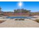 Inviting pool with brick wall and cactus landscaping at 39 Cranberry Cove Ct, Las Vegas, NV 89135