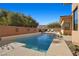 Relax by the pool with views of the desert landscape at 39 Cranberry Cove Ct, Las Vegas, NV 89135