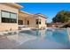 Luxury pool with spacious patio and seating area at 39 Cranberry Cove Ct, Las Vegas, NV 89135