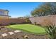 Artificial putting green in backyard at 39 Cranberry Cove Ct, Las Vegas, NV 89135