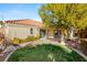 Landscaped backyard with patio and pergola at 4120 Scotmist Ct, Las Vegas, NV 89129