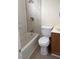 Clean bathroom featuring a shower-tub combo, modern fixtures, and vanity at 441 N 13Th St, Las Vegas, NV 89101