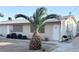 Single-story home features a small yard, covered patio, and desert landscaping at 441 N 13Th St, Las Vegas, NV 89101