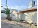 Backyard with palm trees and exterior view of the house at 447 N 13Th St, Las Vegas, NV 89101