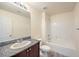 Clean bathroom with granite vanity and a shower/tub combo at 4516 Townwall St, Las Vegas, NV 89115