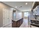 Modern kitchen with an island and stainless steel appliances at 4516 Townwall St, Las Vegas, NV 89115