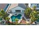 Aerial view of house with pool and landscaped backyard at 5522 Oakview Falls Ct, Las Vegas, NV 89148