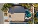 House with tile roof and pool, viewed from above at 5522 Oakview Falls Ct, Las Vegas, NV 89148