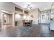 Dining room adjacent to entryway with tile flooring and seating for four at 5522 Oakview Falls Ct, Las Vegas, NV 89148