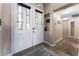 Bright entryway with double doors, stained glass, and a welcoming mat at 5522 Oakview Falls Ct, Las Vegas, NV 89148