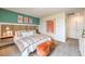 Bright and airy main bedroom with a stylish wooden headboard at 5709 Scarlet Rock St, North Las Vegas, NV 89081