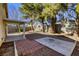 Large backyard with covered patio and gravel at 5954 Wabusca Way, Las Vegas, NV 89142