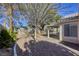 Backyard with covered patio and gravel area at 5954 Wabusca Way, Las Vegas, NV 89142