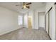 Bedroom with ceiling fan, tile floors, and en-suite at 5954 Wabusca Way, Las Vegas, NV 89142