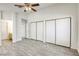 Primary bedroom with tile floors and ample closet space at 5954 Wabusca Way, Las Vegas, NV 89142