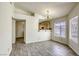 Bright dining area with tile floors and a chandelier at 5954 Wabusca Way, Las Vegas, NV 89142