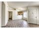 Bright dining room with tile floors and kitchen pass-through at 5954 Wabusca Way, Las Vegas, NV 89142