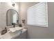 Modern bathroom with hexagon tile and floating vanity at 6034 Pirates Delight Ave, Las Vegas, NV 89139