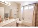 Well-lit bathroom, with shower/tub combo at 6575 Ellerhurst Dr, Las Vegas, NV 89103