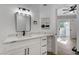 Contemporary bathroom with a quartz vanity, black fixtures, and a view to bedroom at 6821 Santa Isabel Ave # 104, Las Vegas, NV 89146