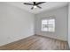 Bright bedroom with wood-look floors and a ceiling fan at 6821 Santa Isabel Ave # 104, Las Vegas, NV 89146