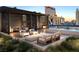 Modern rooftop lounge with fire pit and seating at 700 W Carson Ave # 1405, Las Vegas, NV 89106