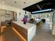 Modern kitchen island with marble countertops in community space at 700 W Carson Ave # 2002, Las Vegas, NV 89106