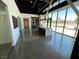 Bright lobby with a large communal table and plenty of natural light at 700 W Carson Ave # 2002, Las Vegas, NV 89106