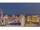 Cityscape view of Las Vegas featuring the iconic Golden Nugget and other buildings against a twilight sky at 700 W Carson Ave # 2506, Las Vegas, NV 89106