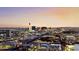 Gorgeous aerial view of the Las Vegas skyline and cityscape at dusk, creating a vibrant and exciting atmosphere at 700 W Carson Ave # 3203, Las Vegas, NV 89106