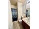 Clean bathroom with shower, toilet and vanity at 7458 Mezzanine View Ave, Las Vegas, NV 89178