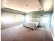 Large main bedroom with carpeted floor and ample natural light at 7458 Mezzanine View Ave, Las Vegas, NV 89178