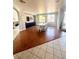 Formal dining room with a large table and wood flooring at 7458 Mezzanine View Ave, Las Vegas, NV 89178