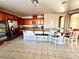 Kitchen features granite countertops and ample wood cabinets at 7458 Mezzanine View Ave, Las Vegas, NV 89178