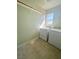 Laundry room with washer, dryer, and overhead storage at 7458 Mezzanine View Ave, Las Vegas, NV 89178